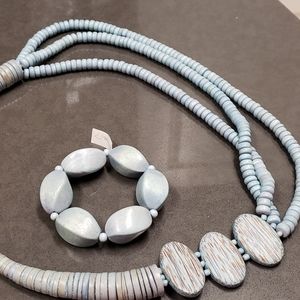 Pale blue necklace with matching bracelet.
